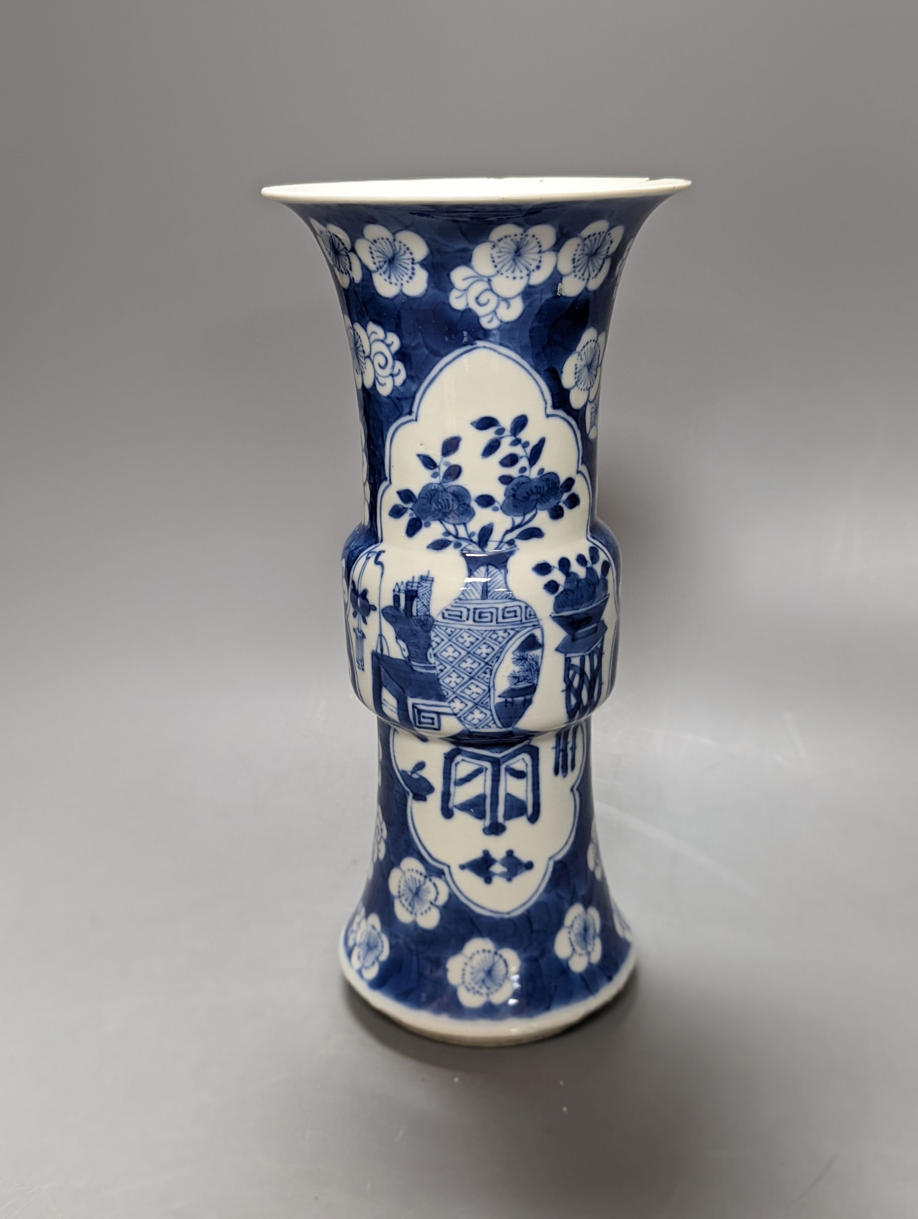A 19th century Chinese blue and white prunus gu vase, 25 cms high.